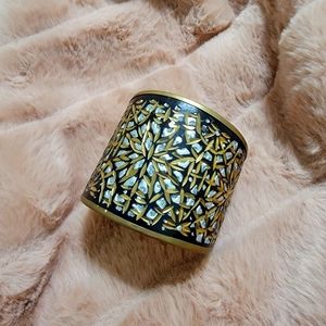 Wide cuff with intricate designs